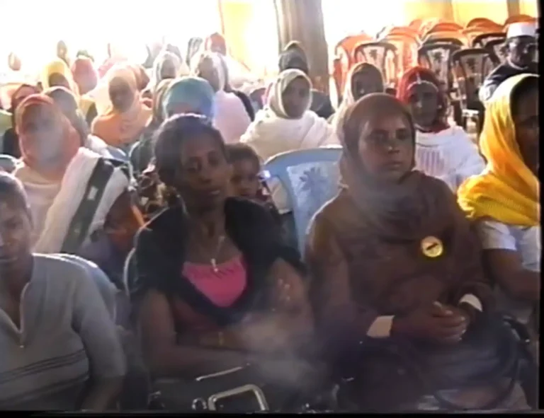 Picture of women sitting in a meeting